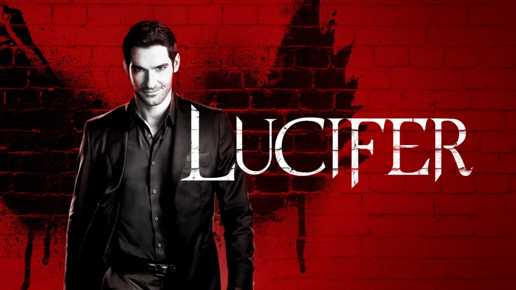 Affiche de la série Lucifer. L'acteur pose devant un mur où il y a des ailes dessus. L'image est en noir et rouge